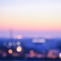 Purple-hued bokeh lighting with a soft, abstract blur